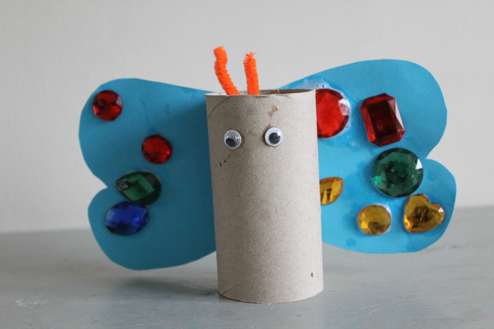 A butterfly made out of toilet rolls